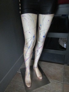 designer tights with paint spatters