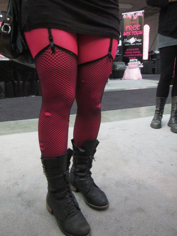 Fishnets layered over pink tights