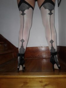 model wears Vanity stockings by Fiore with cuban heel and backseam 1