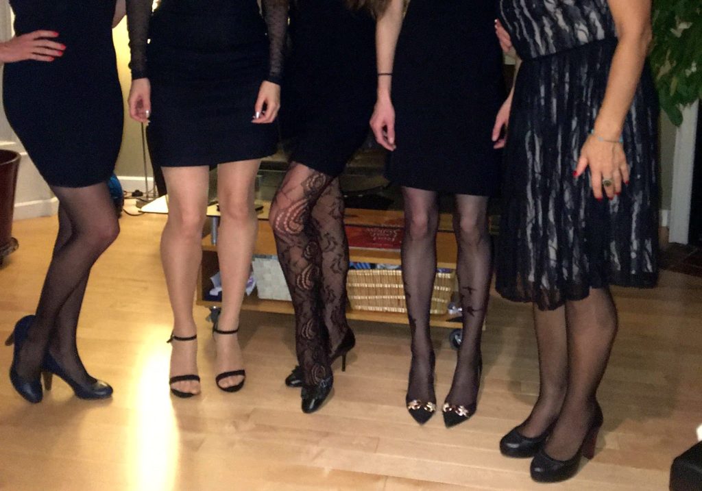 Women in fancy pantyhose at the Femme Fatale party